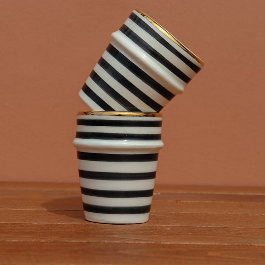 2 gestreifte Zebra-Ringbecher - Gold